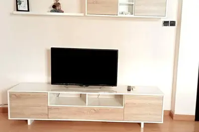 Una televisión o centro de entretenimiento en Alojamiento Esencia I