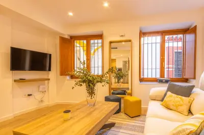 Una televisión o centro de entretenimiento en Apartamento La Cuadra en Centro Cordoba