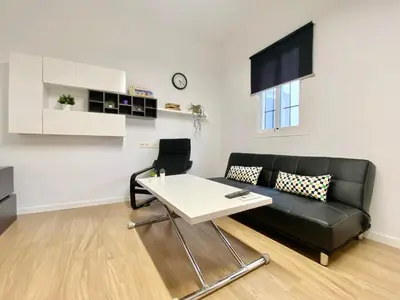 Una televisión o centro de entretenimiento en Apartamento Villa María III