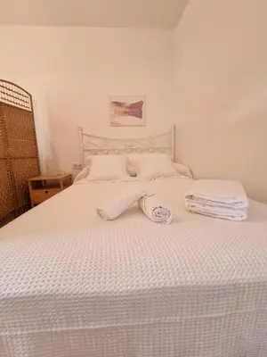 Cama o camas de una habitación en Apartamento con Patio Sevillano