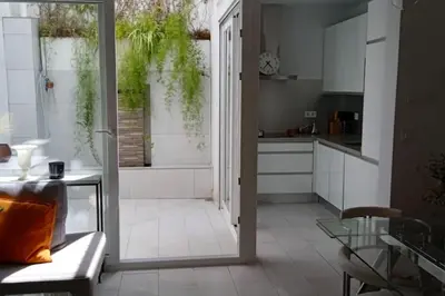 Una cocina o zona de cocina en El patio de Nervión.