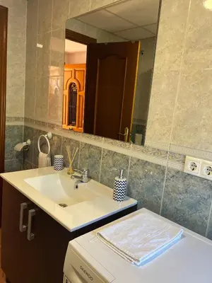 Un baño de APARTAMENTO LA MURALLA 2
