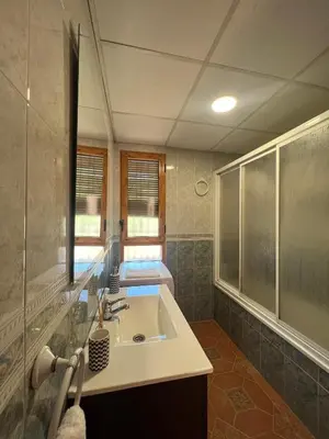 Un baño de APARTAMENTO LA MURALLA 2