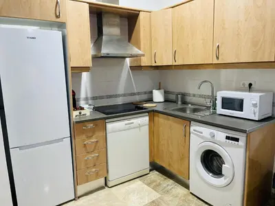 Una cocina o zona de cocina en Apartamento acogedor y moderno en pleno centro de Sevilla con Parking Gratis