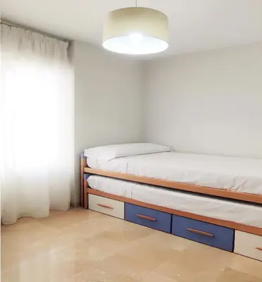 Cama o camas de una habitación en Accommodation Campanario de la Magdalena