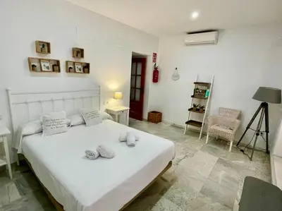 Cama o camas de una habitación en Geysotur Rincón del Sacristán