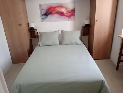 Cama o camas de una habitación en The Corner Terraza