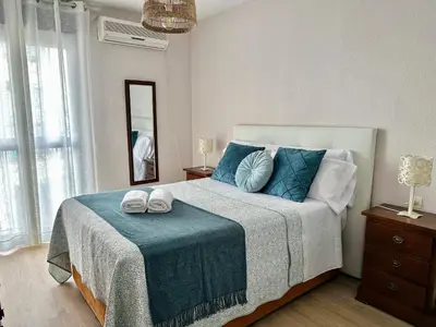 Cama o camas de una habitación en Apartamento Alcázar San Basilio