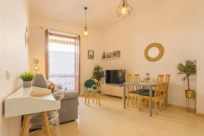 Una televisión o centro de entretenimiento en Apartamento Anais Centro Sevilla