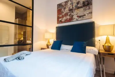 Cama o camas de una habitación en Selecta Patricio Saenz