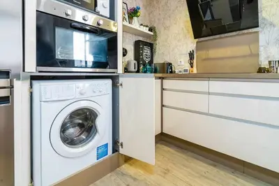 Una cocina o zona de cocina en Apartamento a 500m de la Judería con Parking