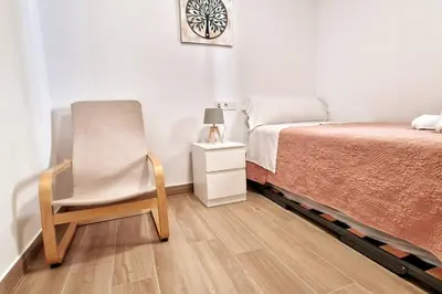 Cama o camas de una habitación en Moderno apartamento Sevilla zona Nervión. WiFi/AC
