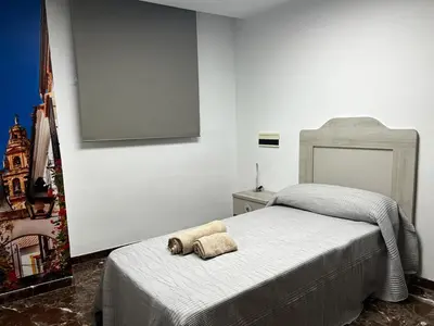 Cama o camas de una habitación en GRACIA