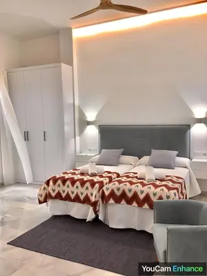 Cama o camas de una habitación en Apart Los Patios de Valladares