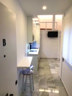 Una cocina o zona de cocina en Apart Los Patios de Valladares