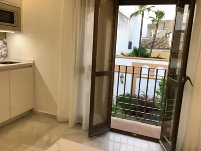 Una cocina o zona de cocina en Apart Los Patios de Valladares