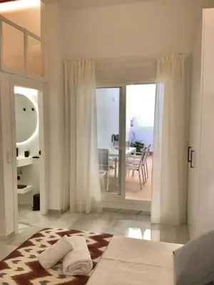 Cama o camas de una habitación en Apart Los Patios de Valladares