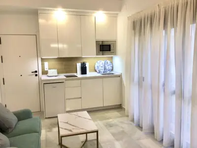 Una cocina o zona de cocina en Apart Los Patios de Valladares