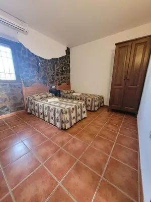 Cama o camas de una habitación en Complejo turístico El Soldado.