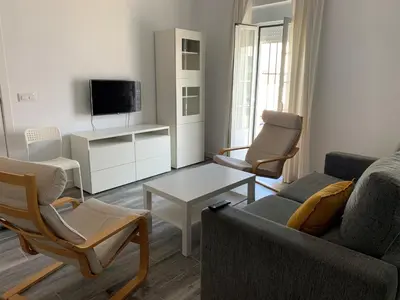 Una televisión o centro de entretenimiento en Apartamento Cañebolo