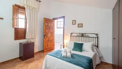 Cama o camas de una habitación en Villa el Señorío Alameda by Ruralidays