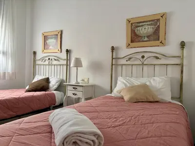 Cama o camas de una habitación en Apartamento Claudio Marcelo, 1