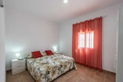 Cama o camas de una habitación en Casa Rural Rafael – Lantejuela