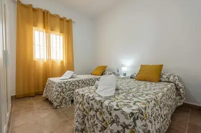 Cama o camas de una habitación en Casa Rural María – Lantejuela