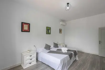 Cama o camas de una habitación en Casa rural Dehesa de las Yeguas