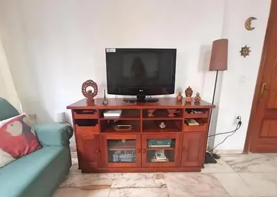 Una televisión o centro de entretenimiento en Casa Con Alma # junto a estación de trenes y muy cerca del centro