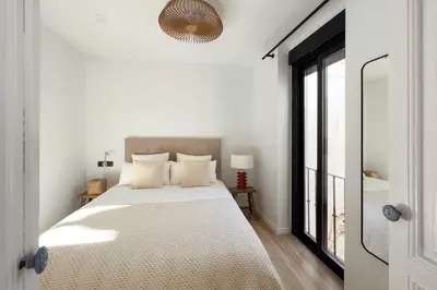 Cama o camas de una habitación en Alohamundi Conde Torrejón - Amazing Penthouse