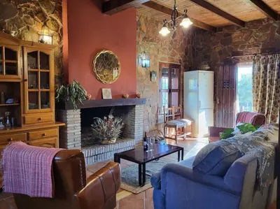 Zona de estar de La Buganvilla, descanso entre olivares