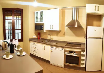 Una cocina o zona de cocina en Apartamento Familiar Juramento