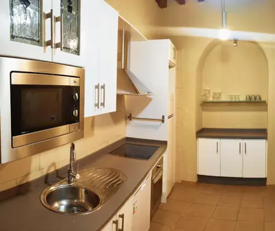 Una cocina o zona de cocina en Apartamento Familiar Juramento