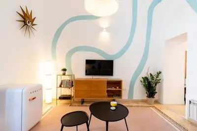 Una televisión o centro de entretenimiento en Apartamento Trahzo