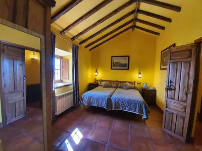 Cama o camas de una habitación en Molino de Las Pilas - Ecoturismo - Caminito del Rey