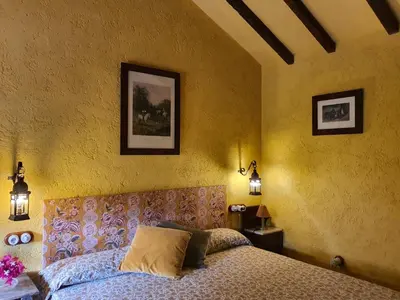 Cama o camas de una habitación en Molino de Las Pilas - Ecoturismo - Caminito del Rey