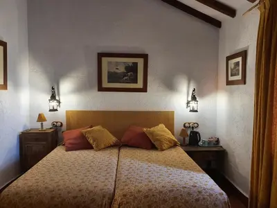 Cama o camas de una habitación en Molino de Las Pilas - Ecoturismo - Caminito del Rey