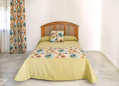 Cama o camas de una habitación en Villa Tela & Vino