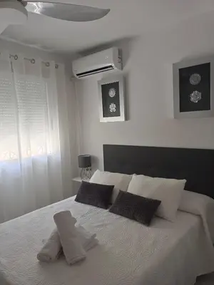 Cama o camas de una habitación en APARTAMENTOS MATUTE