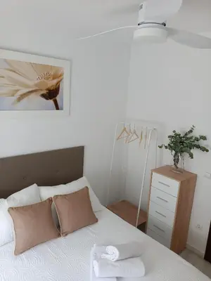 Cama o camas de una habitación en APARTAMENTOS MATUTE