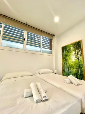 Cama o camas de una habitación en RentalSevilla Tintes