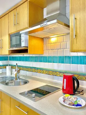Una cocina o zona de cocina en RentalSevilla Tintes