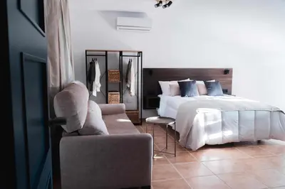 Cama o camas de una habitación en Nido Baeza Suites