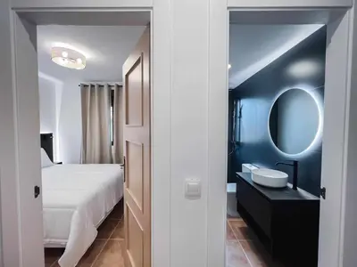 Cama o camas de una habitación en Nido Baeza Suites