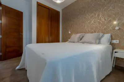 Cama o camas de una habitación en Suite Tazas