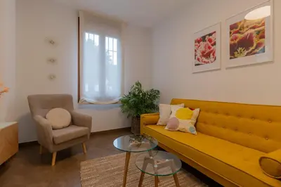 Zona de estar de Suite Tazas
