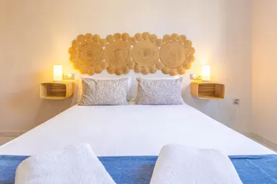 Cama o camas de una habitación en APARTAMENTOS LOS ABUELOS - Cordoba