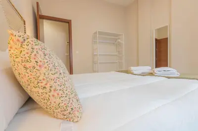 Cama o camas de una habitación en APARTAMENTOS LOS ABUELOS - Cordoba