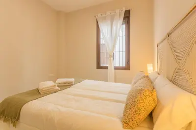 Cama o camas de una habitación en APARTAMENTOS LOS ABUELOS - Cordoba